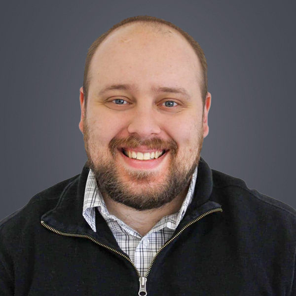 Hospital Director, Ben Blood, smiling while facing forward